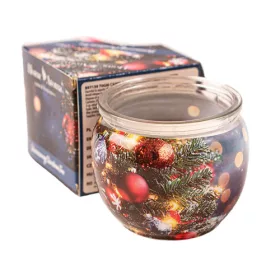 Brad strălucitor de Crăciun, lumânare parfumată, pahar